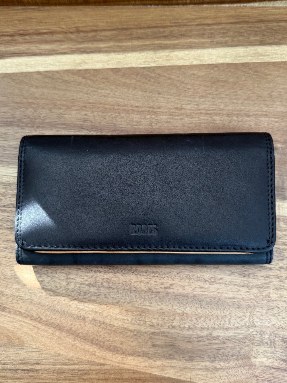 Roots large leather clutch wallet